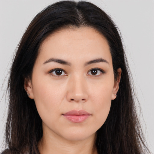 Neutral asian young-adult female with long  brown hair and brown eyes