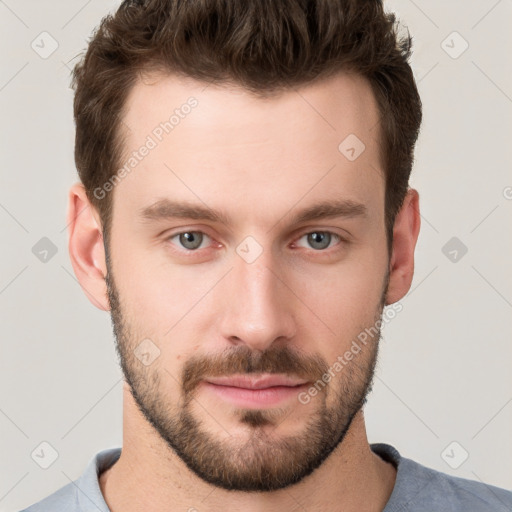 Neutral white young-adult male with short  brown hair and grey eyes