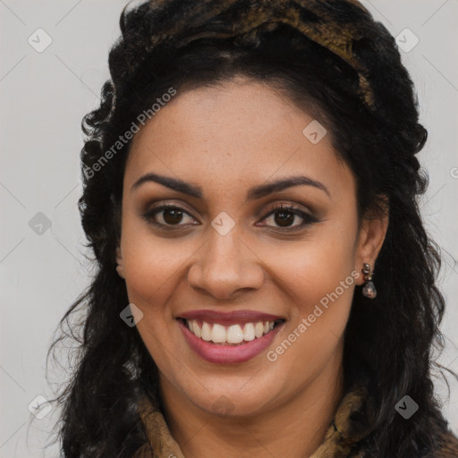 Joyful latino young-adult female with long  brown hair and brown eyes