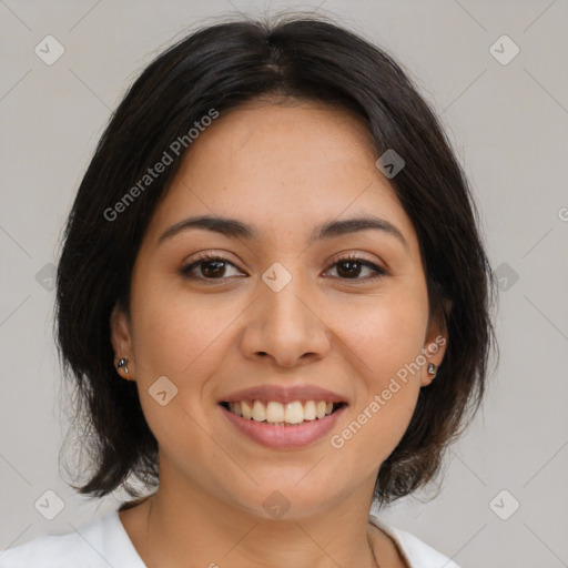 Joyful latino young-adult female with medium  brown hair and brown eyes