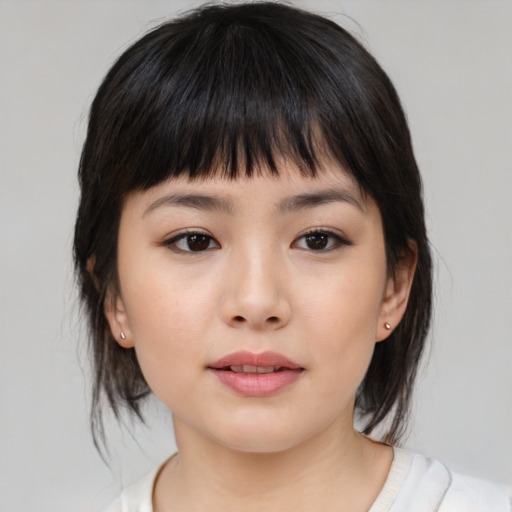 Neutral asian young-adult female with medium  black hair and brown eyes