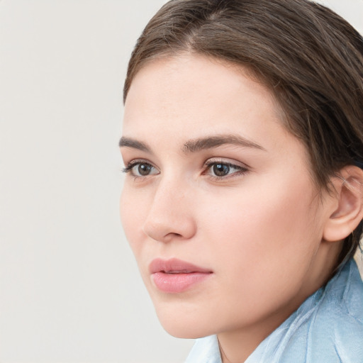 Neutral white young-adult female with short  brown hair and brown eyes