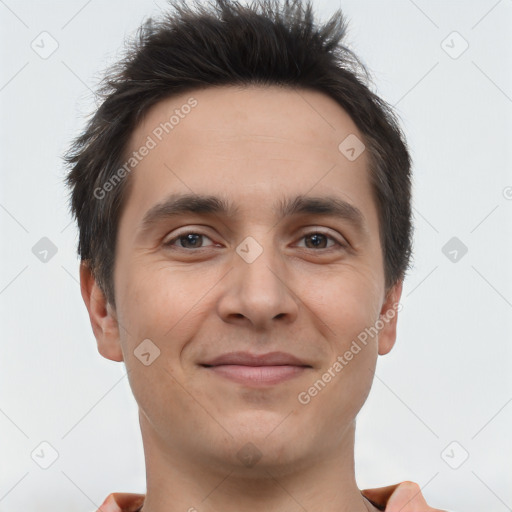 Joyful white young-adult male with short  brown hair and brown eyes