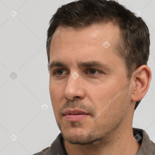 Neutral white adult male with short  brown hair and brown eyes