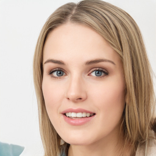 Joyful white young-adult female with long  brown hair and green eyes