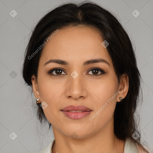 Joyful latino young-adult female with medium  brown hair and brown eyes