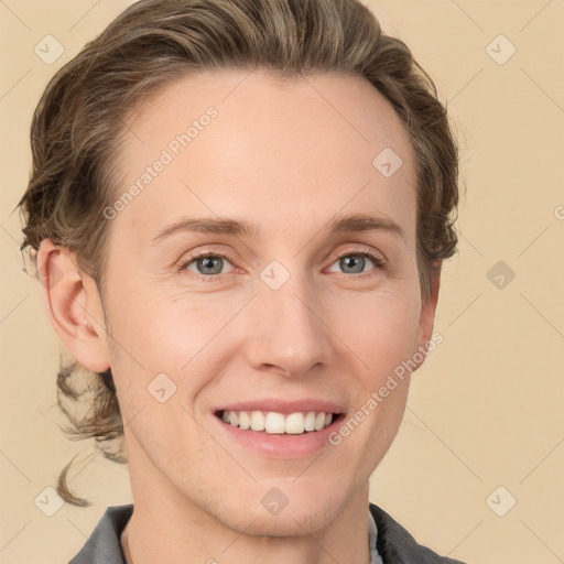 Joyful white young-adult female with short  brown hair and grey eyes