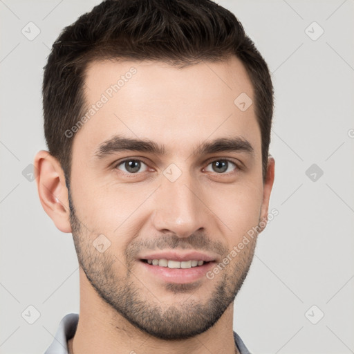 Joyful white young-adult male with short  brown hair and brown eyes