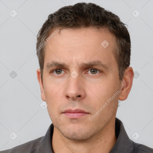 Neutral white adult male with short  brown hair and brown eyes