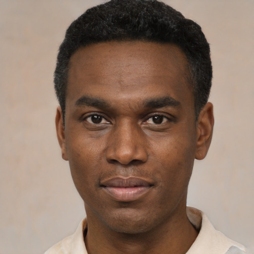 Neutral black young-adult male with short  black hair and brown eyes
