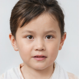 Joyful white child male with short  brown hair and brown eyes