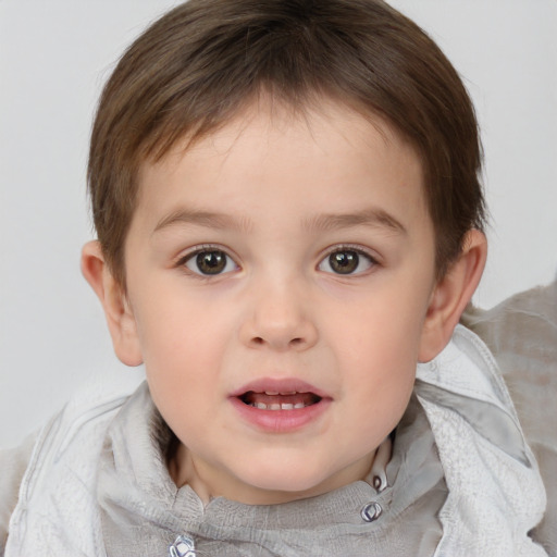 Joyful white child female with short  brown hair and brown eyes