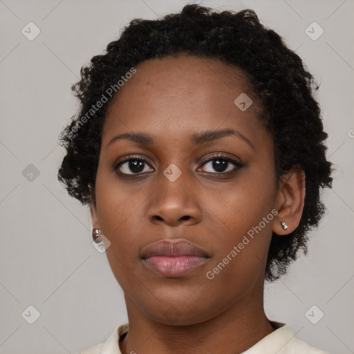 Neutral black young-adult female with short  brown hair and brown eyes