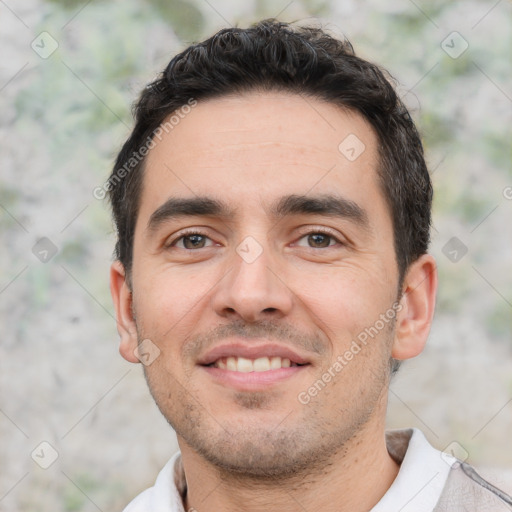 Joyful white young-adult male with short  black hair and brown eyes