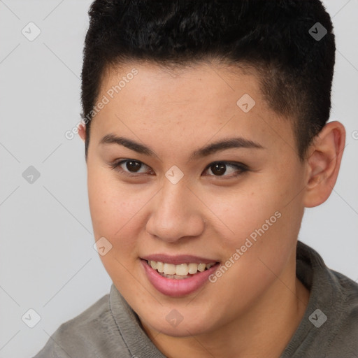 Joyful asian young-adult female with short  brown hair and brown eyes