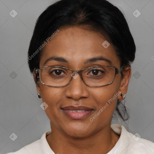 Joyful asian adult female with medium  brown hair and brown eyes