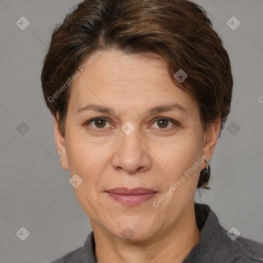 Joyful white adult female with short  brown hair and brown eyes