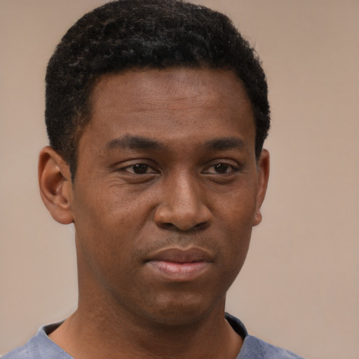 Neutral black young-adult male with short  brown hair and brown eyes