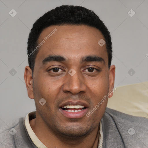 Joyful black young-adult male with short  black hair and brown eyes