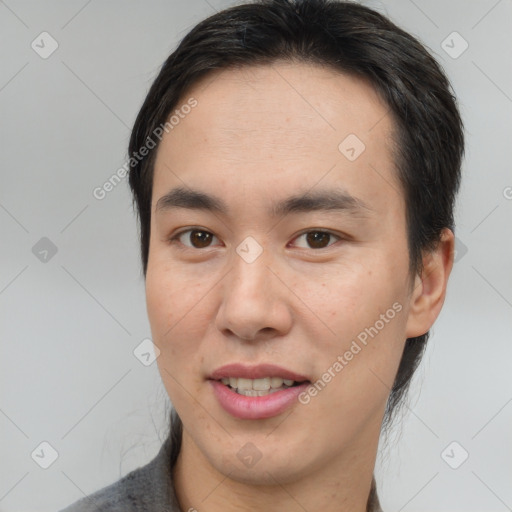 Joyful white young-adult male with medium  brown hair and brown eyes