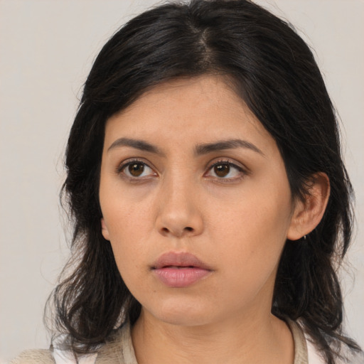 Neutral asian young-adult female with medium  black hair and brown eyes