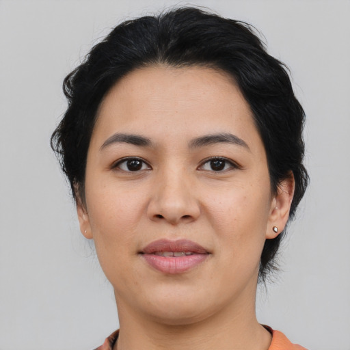 Joyful asian young-adult female with medium  black hair and brown eyes