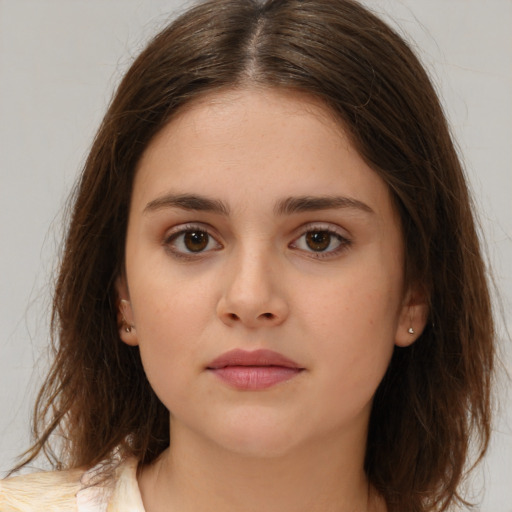 Neutral white young-adult female with medium  brown hair and brown eyes