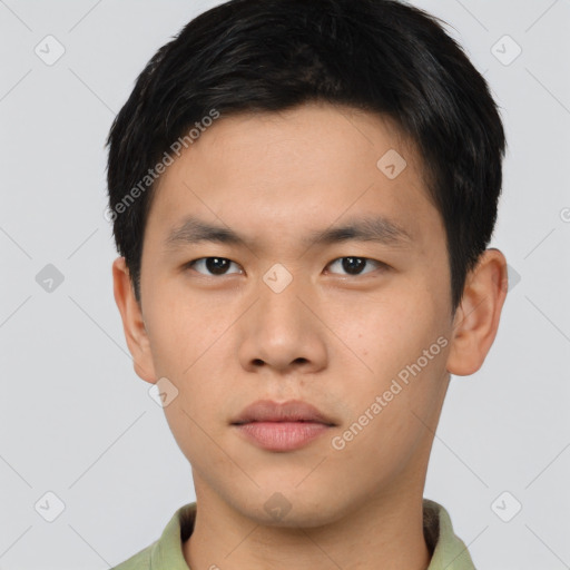 Neutral asian young-adult male with short  brown hair and brown eyes