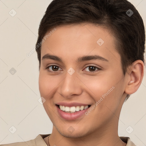 Joyful white young-adult female with short  brown hair and brown eyes