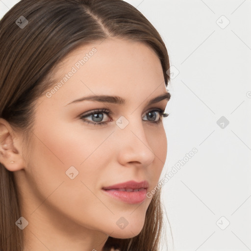 Neutral white young-adult female with long  brown hair and brown eyes