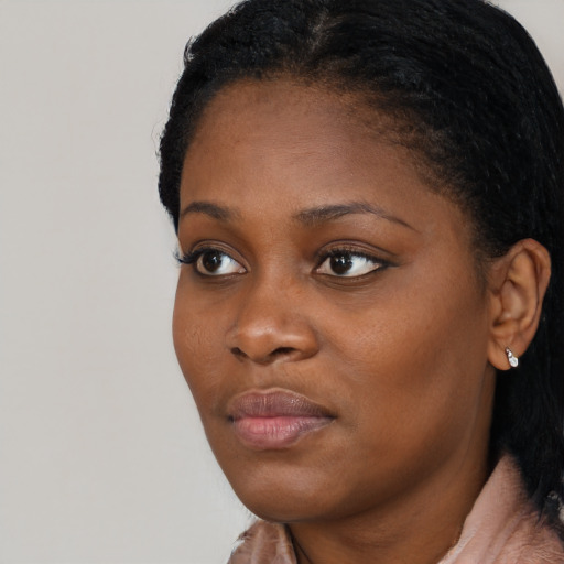 Neutral black young-adult female with short  black hair and brown eyes