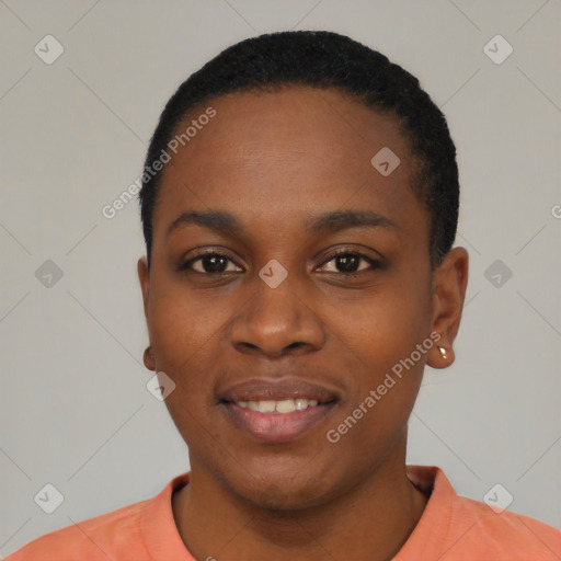 Joyful black young-adult female with short  black hair and brown eyes