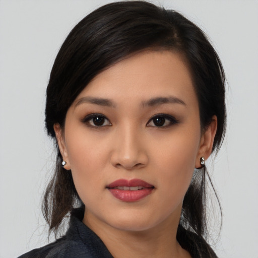 Neutral asian young-adult female with medium  black hair and brown eyes