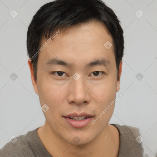 Neutral asian young-adult male with short  brown hair and brown eyes