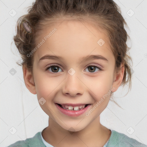 Joyful white child female with short  brown hair and brown eyes