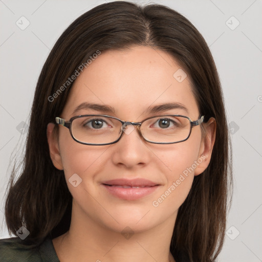 Joyful white young-adult female with medium  brown hair and grey eyes