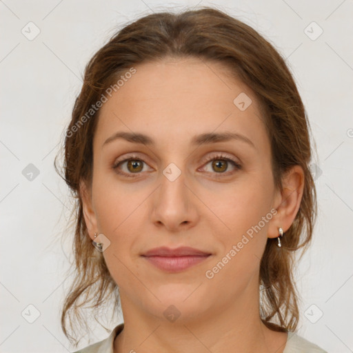 Joyful white young-adult female with medium  brown hair and green eyes