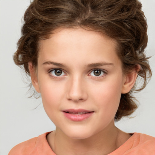 Joyful white child female with medium  brown hair and brown eyes