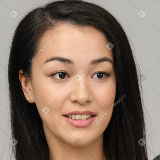 Joyful asian young-adult female with long  brown hair and brown eyes