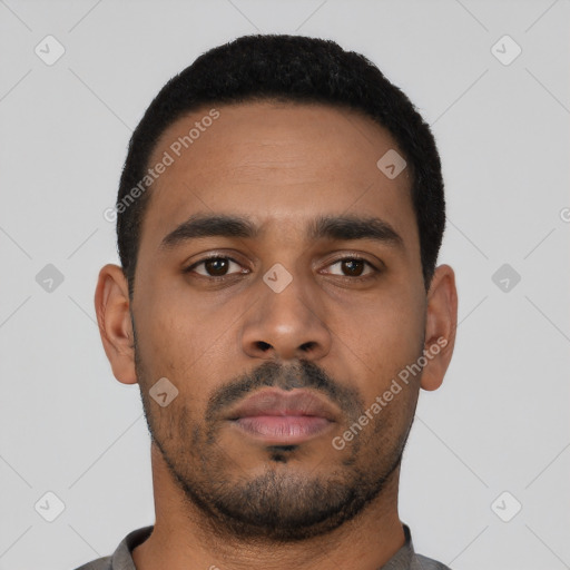 Neutral latino young-adult male with short  black hair and brown eyes
