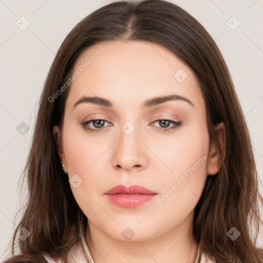 Neutral white young-adult female with long  brown hair and brown eyes