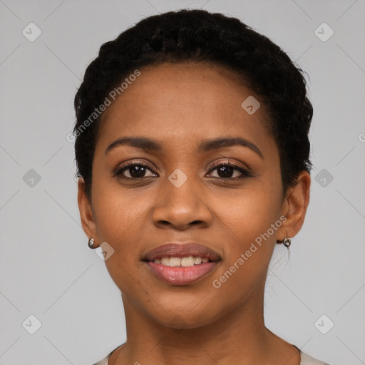 Joyful latino young-adult female with short  black hair and brown eyes