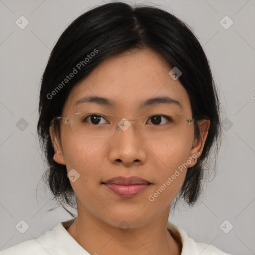 Joyful asian young-adult female with medium  black hair and brown eyes