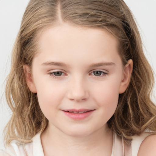 Joyful white child female with medium  brown hair and grey eyes