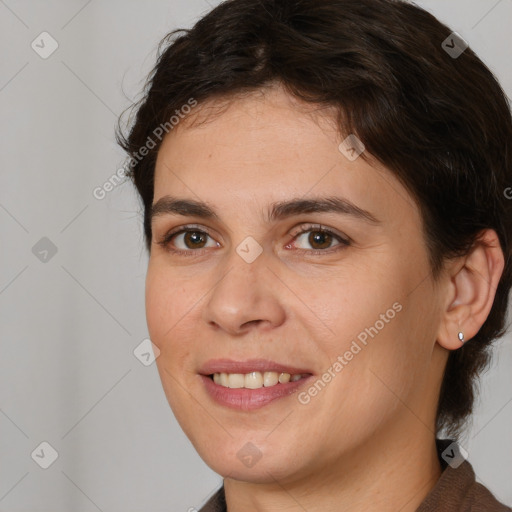 Joyful white young-adult female with medium  brown hair and brown eyes