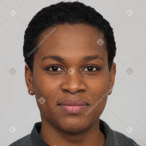 Joyful black young-adult female with short  black hair and brown eyes