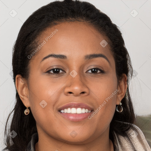 Joyful latino young-adult female with long  brown hair and brown eyes