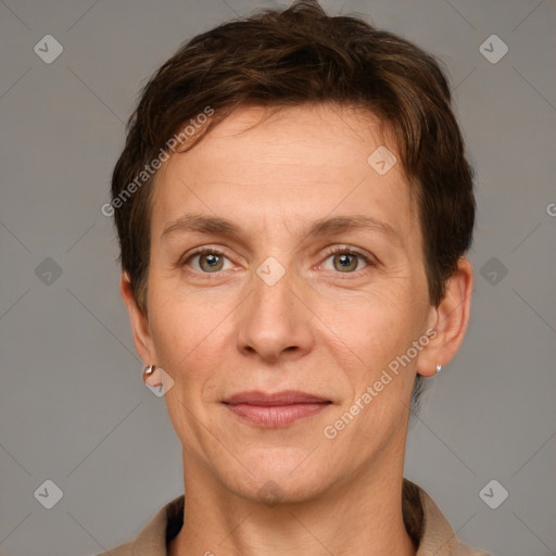 Joyful white adult male with short  brown hair and grey eyes