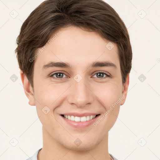 Joyful white young-adult female with short  brown hair and grey eyes