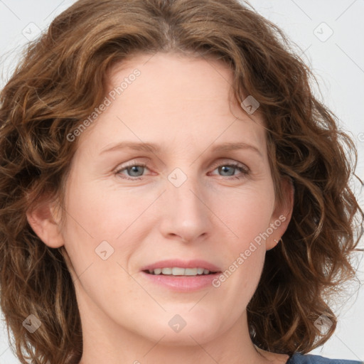 Joyful white young-adult female with medium  brown hair and green eyes